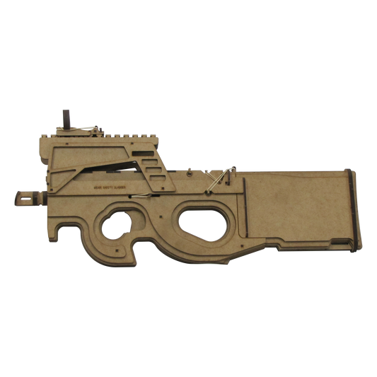 A wooden rubber band gun modeled after the P90 submachine gun, featuring detailed cutouts, a mounted top rail, and working rubber band mechanics. The trigger and grip are stylized in the iconic bullpup layout, with engraved safety instructions on the body.